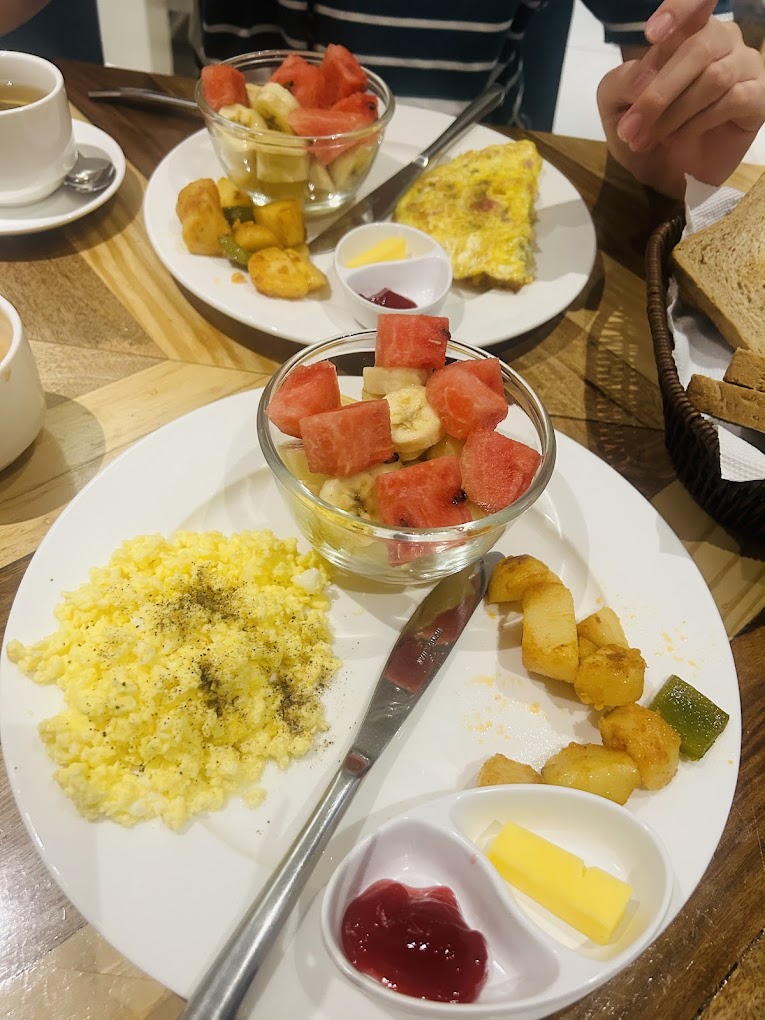 Complimentary breakfast at Ananta Home &mdash; fresh fruit and masala chai